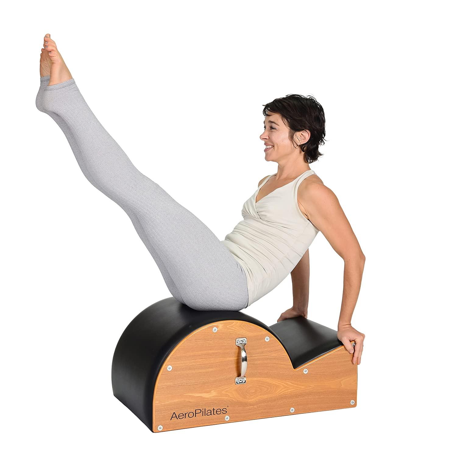imageAeroPilates Stamina Products Posture Corrector Pilates Barrel with Upholstered Surface and Built In Handle for Strength Training Wood and BlackSpine Corrector Pilates Barrel