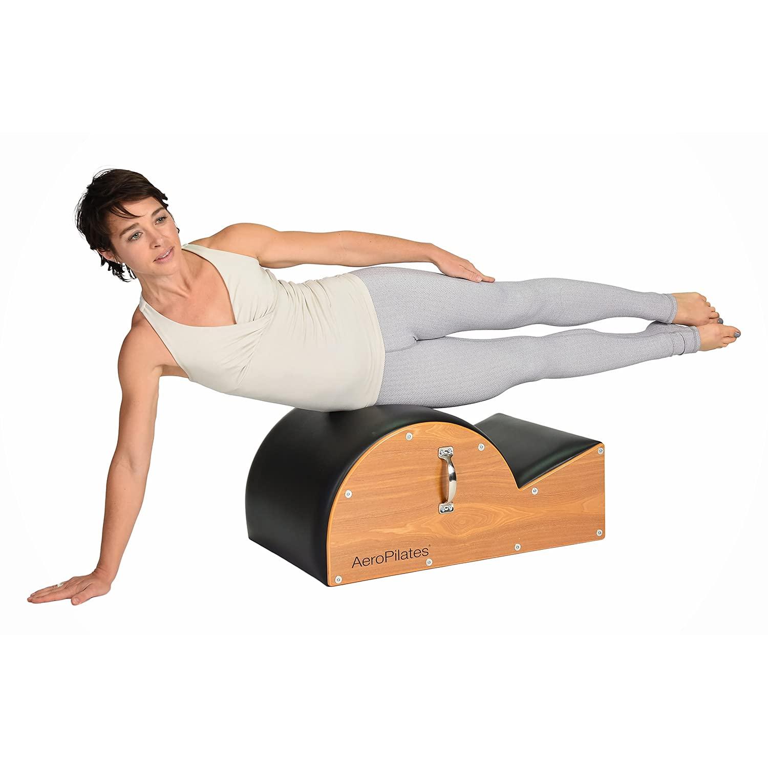 imageAeroPilates Stamina Products Posture Corrector Pilates Barrel with Upholstered Surface and Built In Handle for Strength Training Wood and BlackSpine Corrector Pilates Barrel