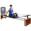 imageStamina Products AeroPilates Pro 565 Pilates Reformer with Oak Wood Base  Studio Grade for Home Use with Cardio Rebounder Adjustable Foot Bar 4 Resistance Springs and Workout DVDPro XP 557