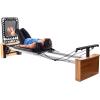 imageStamina Products AeroPilates Pro 565 Pilates Reformer with Oak Wood Base  Studio Grade for Home Use with Cardio Rebounder Adjustable Foot Bar 4 Resistance Springs and Workout DVDPro XP 557