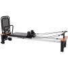 imageStamina Products AeroPilates Pro 565 Pilates Reformer with Oak Wood Base  Studio Grade for Home Use with Cardio Rebounder Adjustable Foot Bar 4 Resistance Springs and Workout DVDPro Series 565